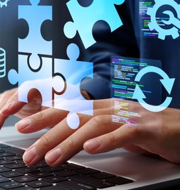 Hands typing on a laptop, surrounded by digital icons of gears, puzzle pieces, and code, representing software development and problem-solving.