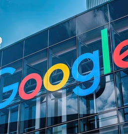 Building with google logo attached to the glass windows