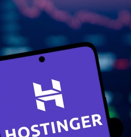 Mobile phone showing Hostinger logo