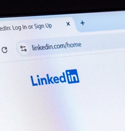Laptop screen showing the LinkedIn login page
