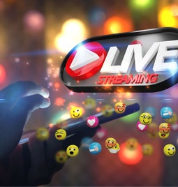 hand tapping phone with large graphic of emojis and the words live streaming