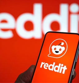 Reddit Logo on desktop and phone screens