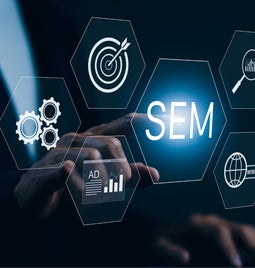 Hands tapping a screen that says 