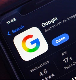 Mobile phone app store showing google app